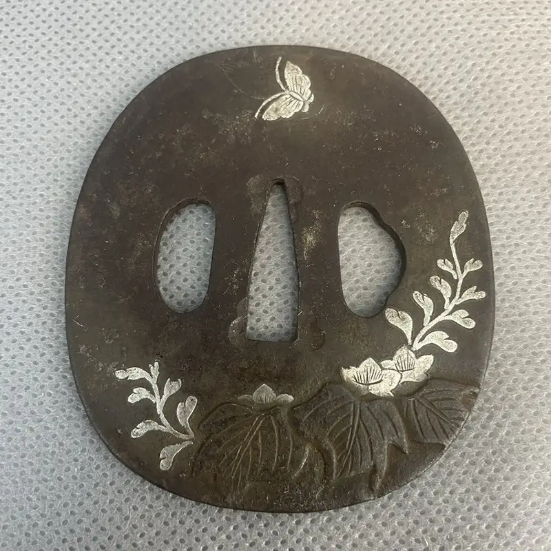 Tsuba incrustee en TAKA ZOGAN Tsuba en fer incrustee en TAKA ZOGAN